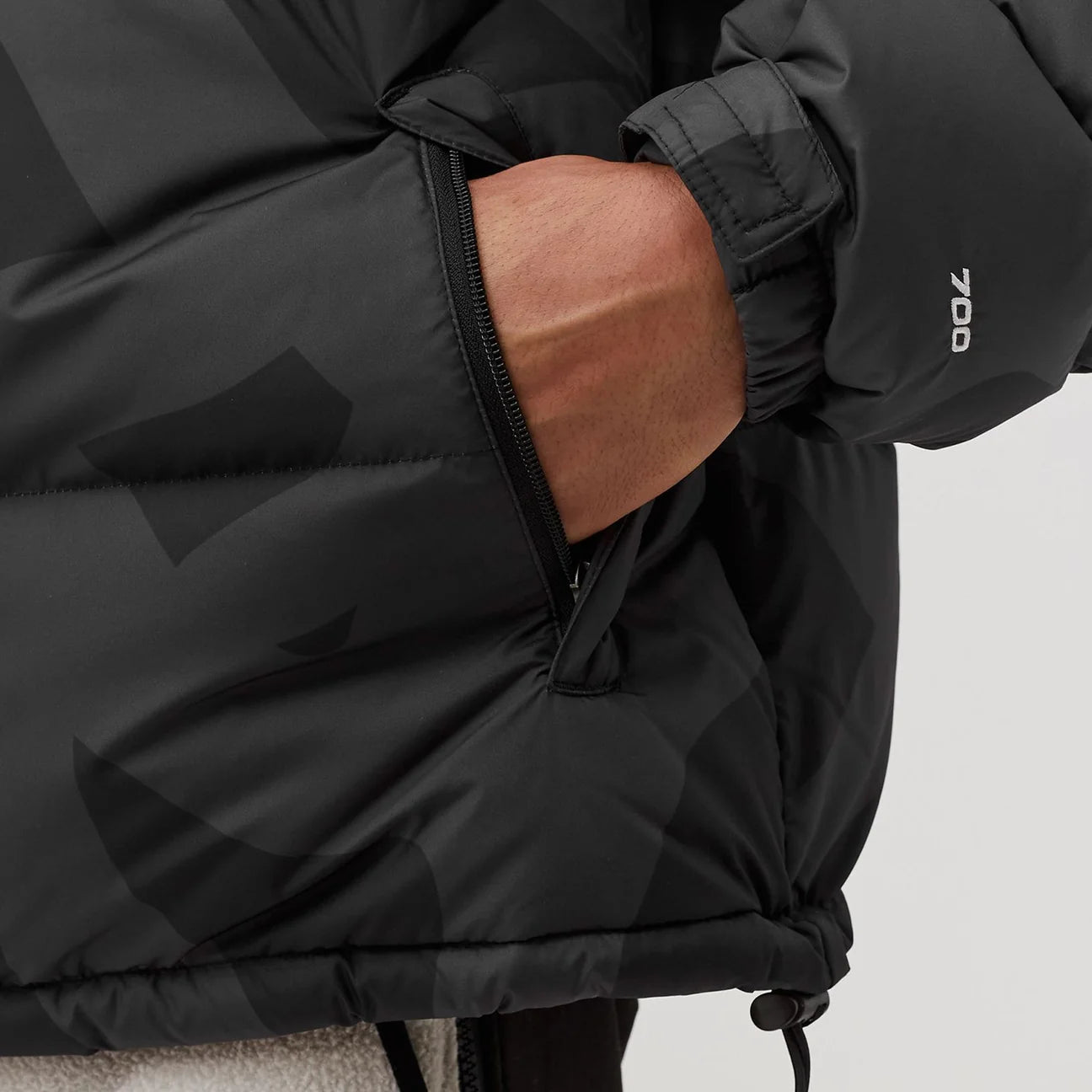 The Northface X KAWS Puffer Jacket